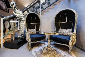 A seating area at RQ Boutique & Unique Hotel
