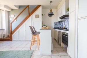 A kitchen or kitchenette at La Mansarda di San Lorenzo
