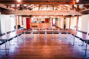 a large conference room with a long table and chairs at Krokstad Herrgård in Säffle