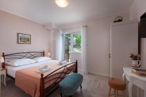 Posteľ alebo postele v izbe v ubytovaní Villa Beloved near Baska Voda, private pool + 24 fotografií