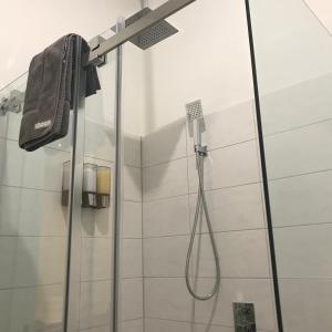 a bathroom with a shower with a shower head at Forest View in Creswick
