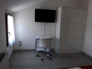 TV a/nebo společenská místnost v ubytování B&B Casa Taty