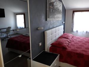 Postel nebo postele na pokoji v ubytování B&B Casa Taty