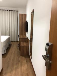 Postel nebo postele na pokoji v ubytování Hotel Matrix