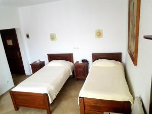 Postel nebo postele na pokoji v ubytování Hotel Etrusco