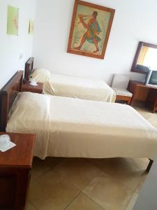 Postel nebo postele na pokoji v ubytování Hotel Etrusco + 22 fotografií
