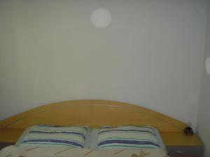 Posteľ alebo postele v izbe v ubytovaní Janó Apartman