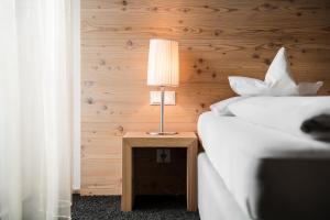 Voodi või voodid majutusasutuse Hotel Heini toas