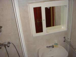 Kúpeľňa v ubytovaní Janó Apartman
