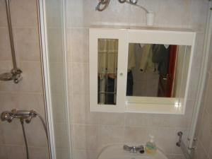 Kúpeľňa v ubytovaní Janó Apartman