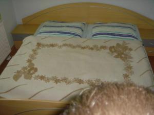 Posteľ alebo postele v izbe v ubytovaní Janó Apartman