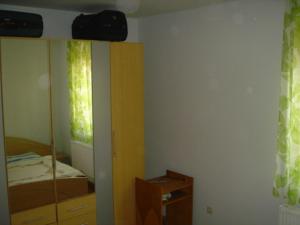 Posteľ alebo postele v izbe v ubytovaní Janó Apartman