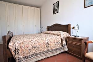 Posteľ alebo postele v izbe v ubytovaní Casa delle Palme