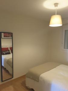 Ein Bett oder Betten in einem Zimmer der Unterkunft Cuesta del Tajillo