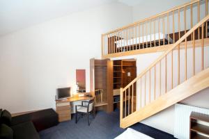TV a/nebo společenská místnost v ubytování Club Hotel am Kreischberg