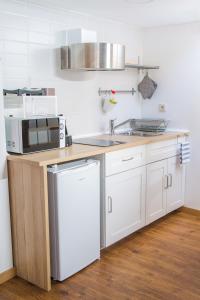 Η κουζίνα ή μικρή κουζίνα στο Alboi Loft +18 φωτογραφίες