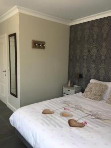 Rúm í herbergi á Guesthouse De Middelvelden