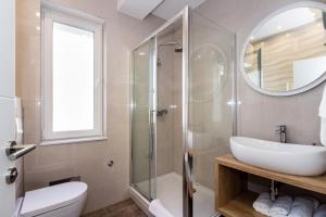Kúpeľňa v ubytovaní Lugo Apartments
