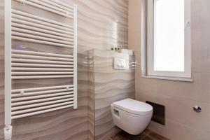 Kúpeľňa v ubytovaní Lugo Apartments