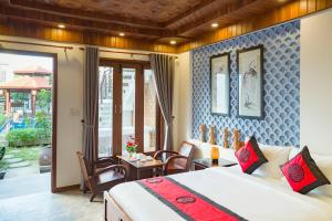 Postel nebo postele na pokoji v ubytování Green Grapefruit Villa