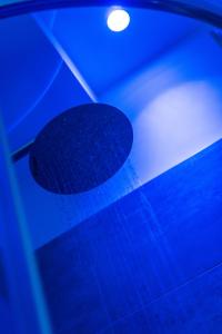 a blue light on top of a table at B&B Elegance in Taormina