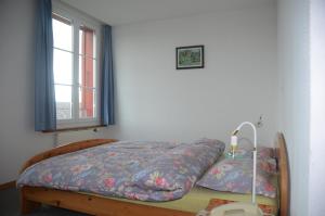 Ein Bett oder Betten in einem Zimmer der Unterkunft Hotel Restaurant Bahnhof