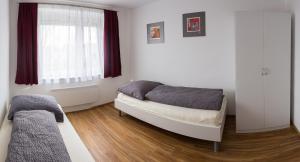 Postel nebo postele na pokoji v ubytování eder-home