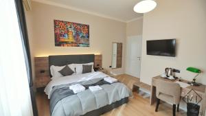 Postel nebo postele na pokoji v ubytování MARION HOTEL