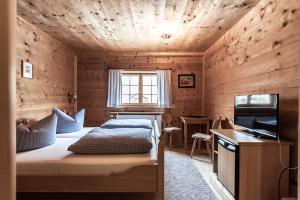 Postel nebo postele na pokoji v ubytování Gämsle Hotel, Wirtshaus & mehr