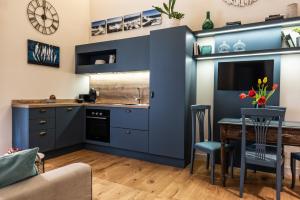 Four Elements Apartments tesisinde mutfak veya mini mutfak