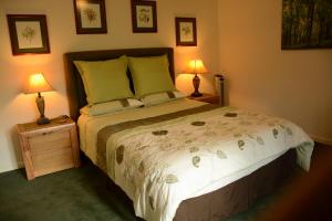 מיטה או מיטות בחדר ב-Les noyers aulnay