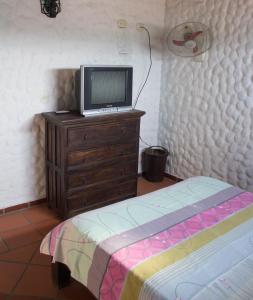Ein Bett oder Betten in einem Zimmer der Unterkunft Posada El Abuelo