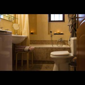 a bathroom with a toilet and a sink and a tub at Villa Agno - Βίλα Αγνώ in Ãno KariaÃ­ +97 photos