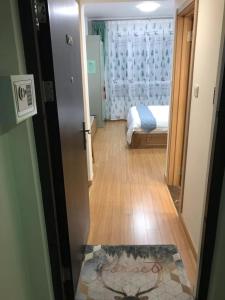 Fotografie z fotogalerie ubytování Songhua Lake Qingshan Snow View Apartment v destinaci Jilin