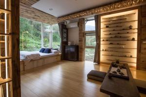 Voodi või voodid majutusasutuse Yilan For A Night B&B toas