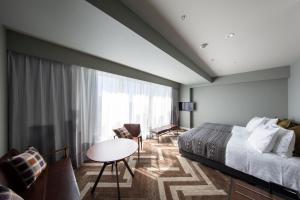 Voodi või voodid majutusasutuse SHIBUYA STREAM HOTEL formerly Shibuya Stream Excel Hotel Tokyu toas