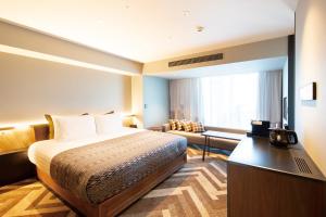 Voodi või voodid majutusasutuse SHIBUYA STREAM HOTEL formerly Shibuya Stream Excel Hotel Tokyu toas