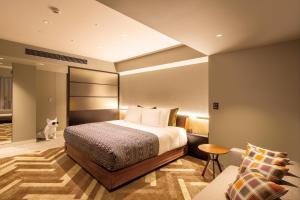 Voodi või voodid majutusasutuse SHIBUYA STREAM HOTEL formerly Shibuya Stream Excel Hotel Tokyu toas