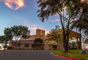 a rendering of the front of a hotel at Comfort Suites NW Dallas Near Love Field in Dallas