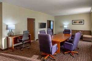 a conference room with a table and chairs at Comfort Suites NW Dallas Near Love Field in Dallas
