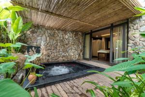 Ein Garten an der Unterkunft Hoi An Eco Lodge & Spa