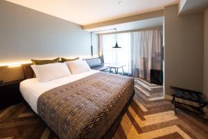 Voodi või voodid majutusasutuse SHIBUYA STREAM HOTEL formerly Shibuya Stream Excel Hotel Tokyu toas