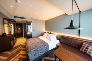 Voodi või voodid majutusasutuse SHIBUYA STREAM HOTEL formerly Shibuya Stream Excel Hotel Tokyu toas