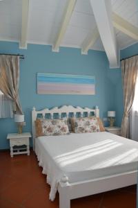 Katil atau katil-katil dalam bilik di Emeraldway - Appartamento Stylish & De Luxe Cala del Faro - Porto Cervo