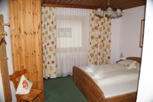 A bed or beds in a room at Apartment Rauch