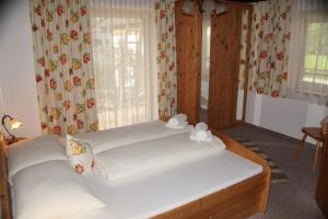 A bed or beds in a room at Apartment Rauch
