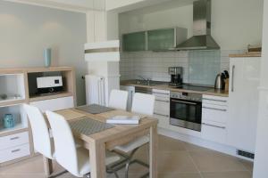 Η κουζίνα ή μικρή κουζίνα στο Haus Südwind am Ostdeich