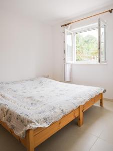 Posteľ alebo postele v izbe v ubytovaní Sunce i More