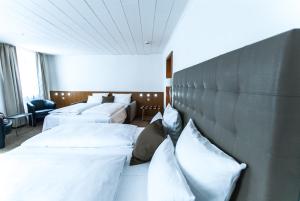Postelja oz. postelje v sobi nastanitve Bayerischer Hof