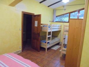 Postel nebo postele na pokoji v ubytování Albergue Areitz Soroa